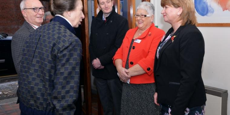 Morag (dressed in coral) meeting our Patron HRH The Princess Royal in November 2016