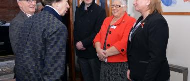 Morag (dressed in coral) meeting our Patron HRH The Princess Royal in November 2016